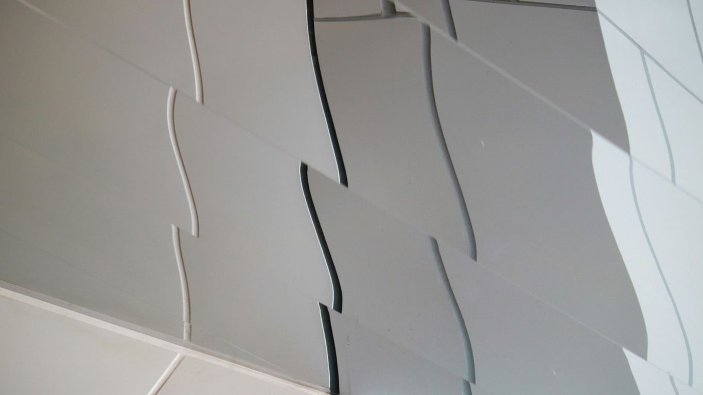 a white rectangular object with wires